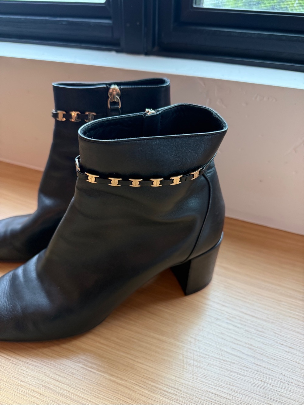 Salvatore Ferragamo Black Leather Ankle Boots with Gold Chain Accent